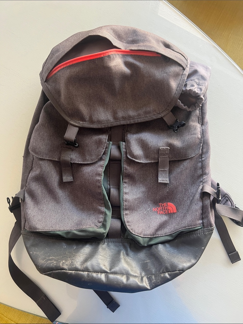 The North Face Brown Backpack with Red Logo and Black Base